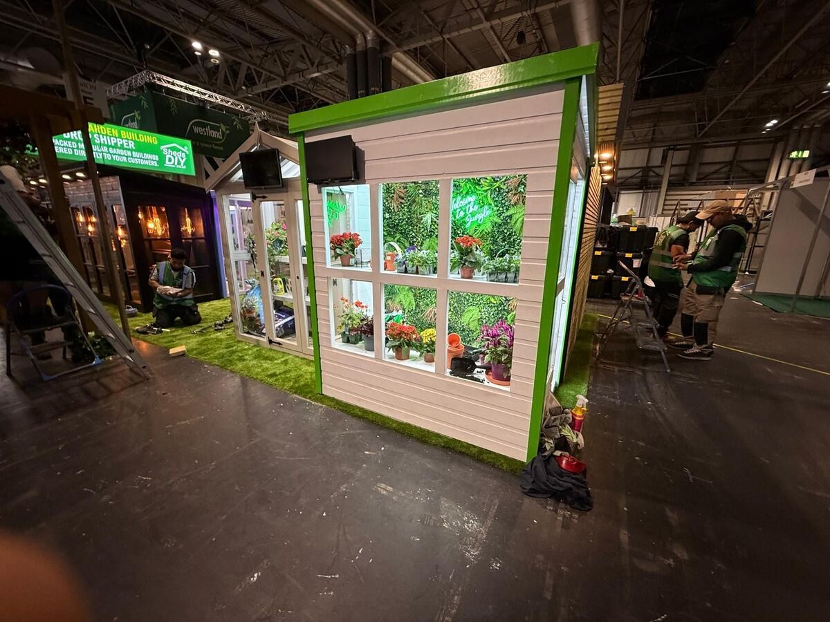 Total Sheds Potting Shed at Glee Garden Show, NEC Birmingham — front view with French doors